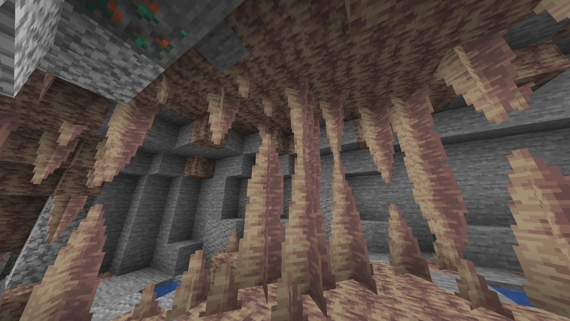 Остроконечный сталактит в стандартном стиле Minecraft.