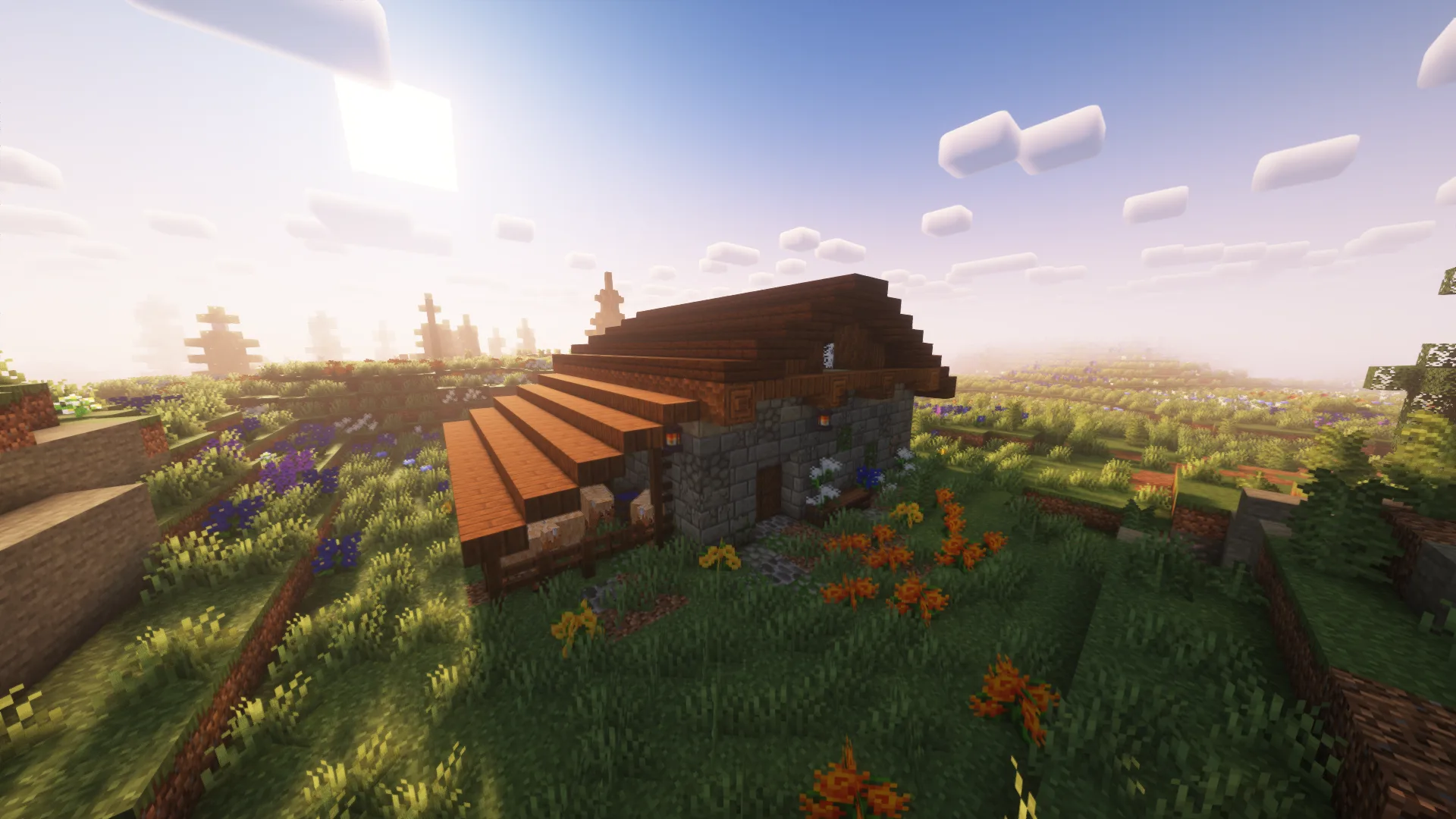 Деревянный амбар в стиле мода Let's Do: Structures на лугу в Minecraft.