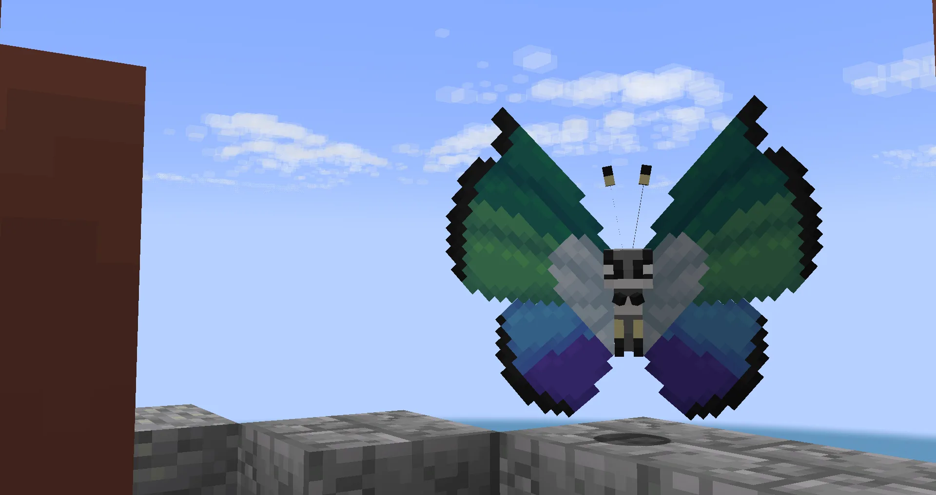 Вивильон с мятным узором из мода Cobblemon.