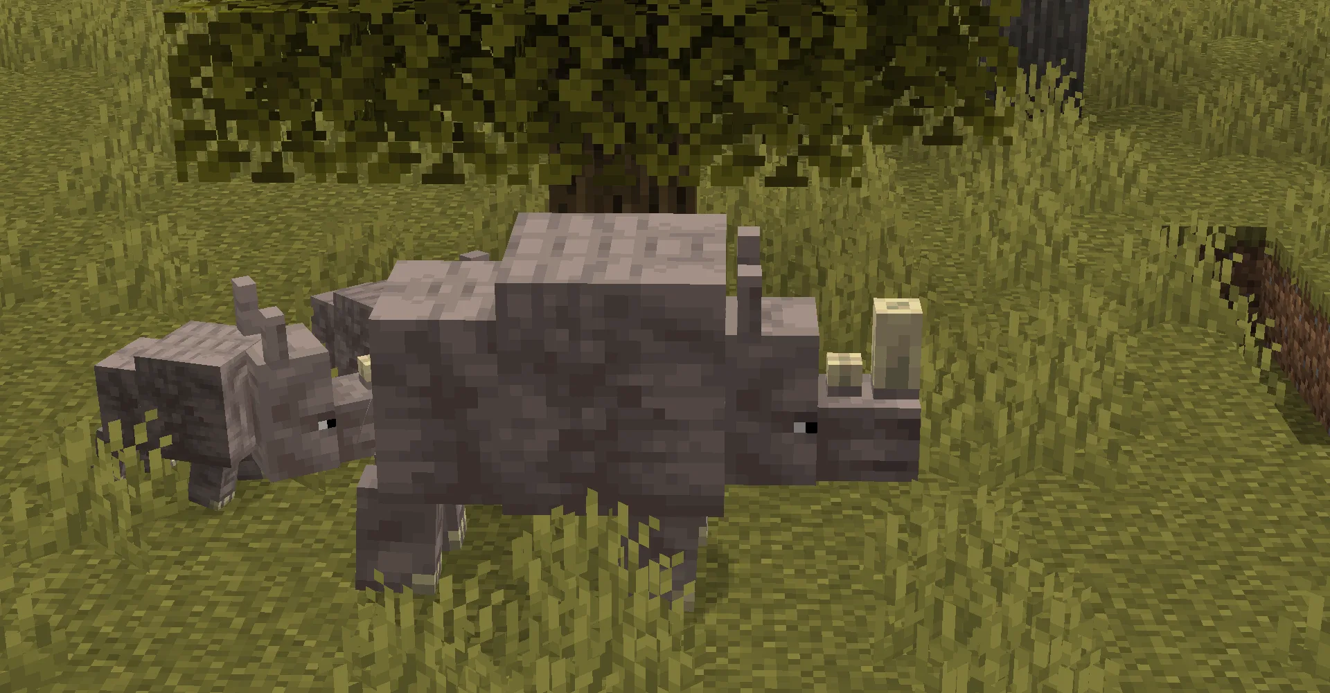 Взрослый носорог с детенышем в биоме саванны (мод Naturalist).