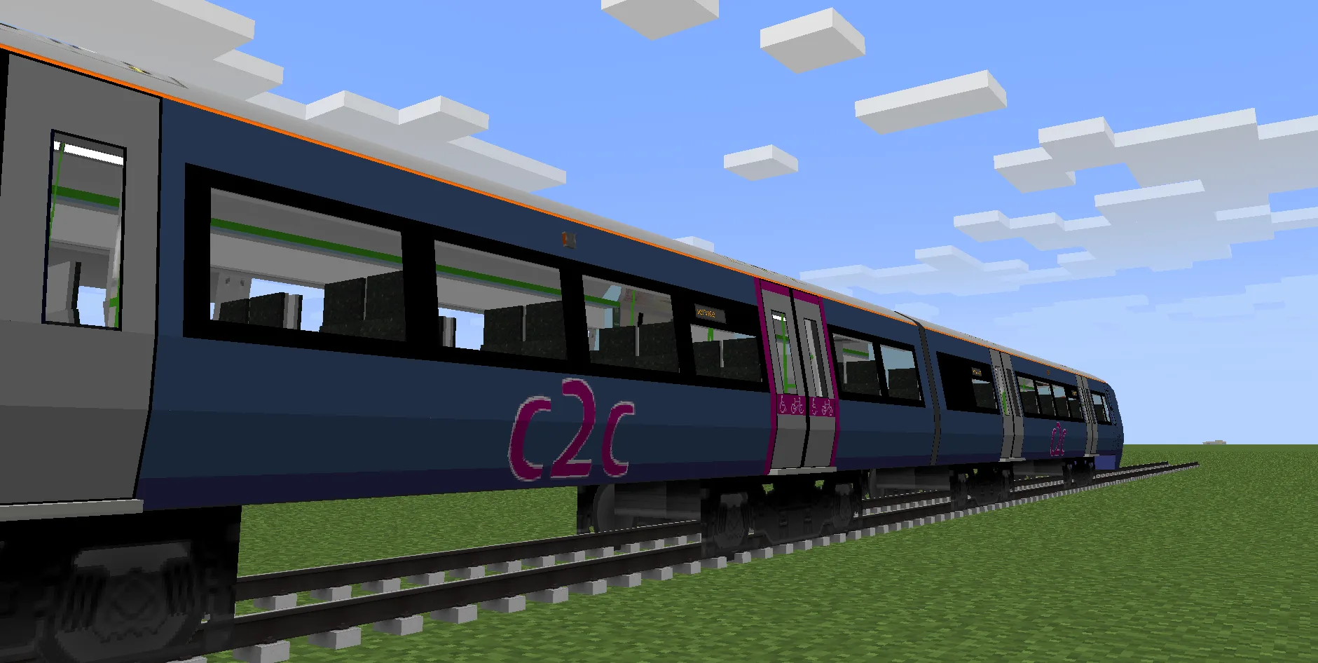 Синяя ливрея поезда c2c Class 357 с маркировкой доступной зоны