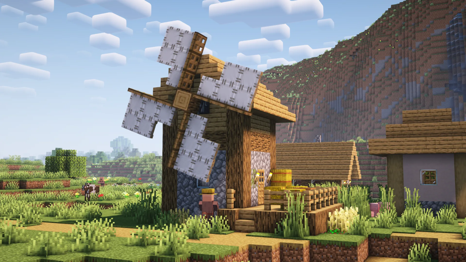 Ветряная мельница из мода Create: Structures в равнинной деревне.