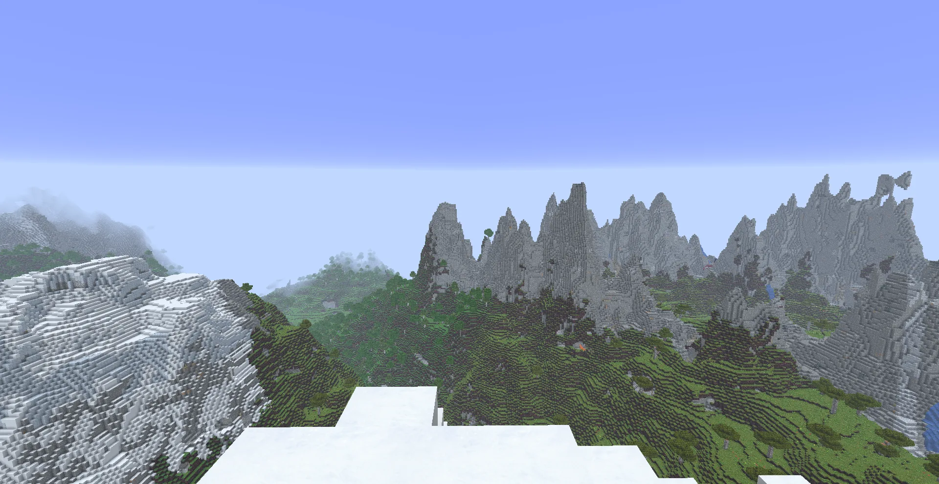 Ресурс-пак Realism upscaled: заснеженные и каменные горные пики.