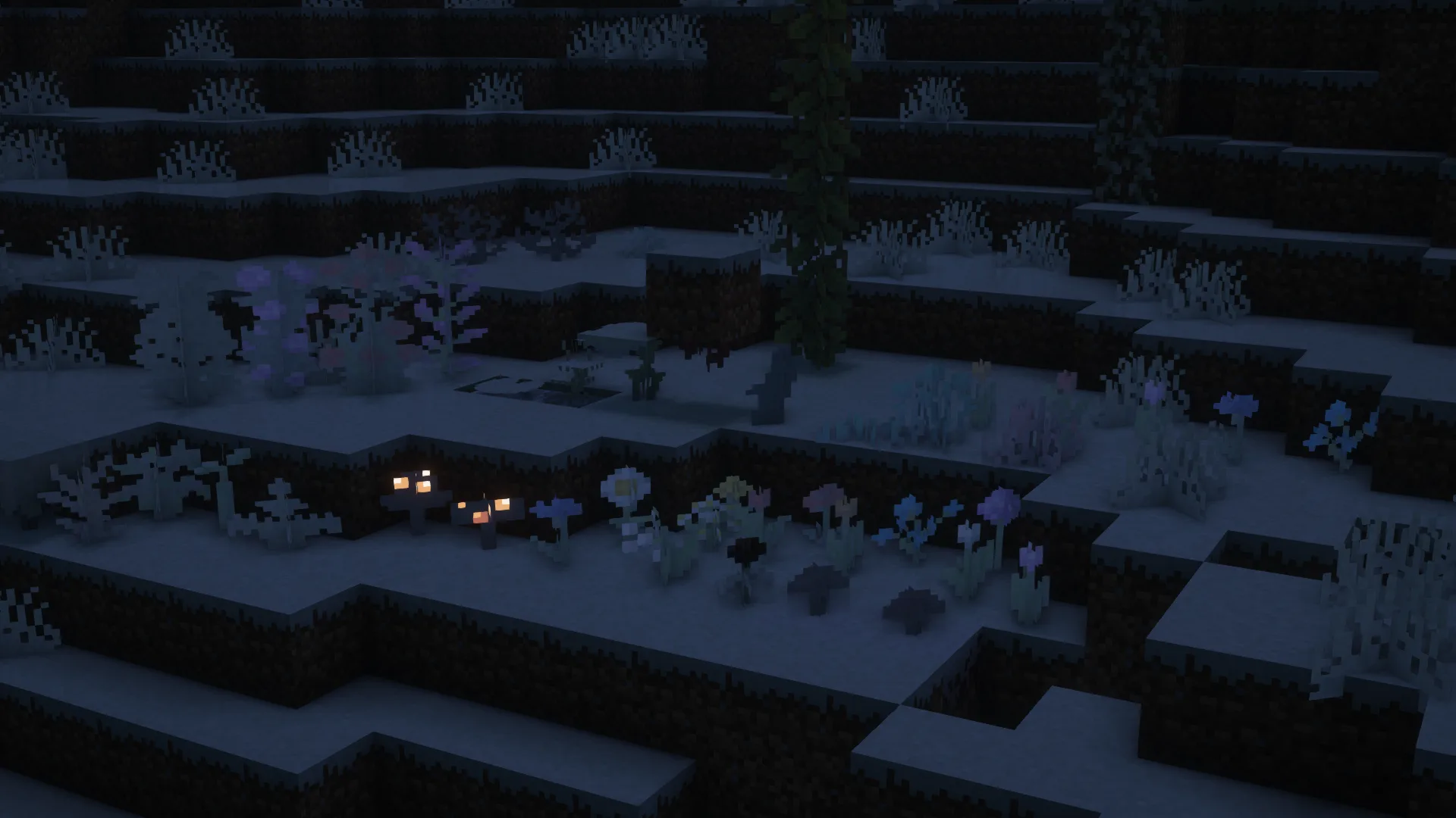 Снежный мир с замерзшими растениями.