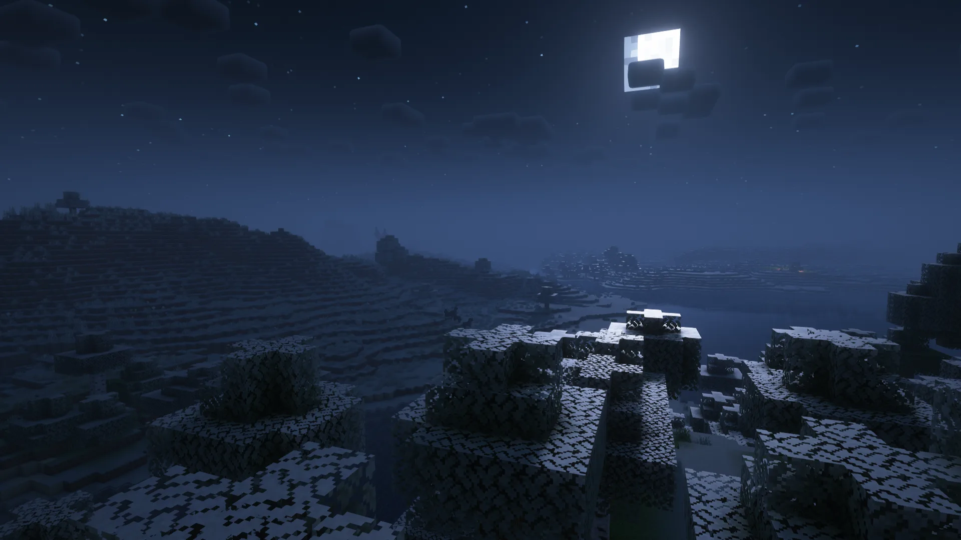 Снег ночью в мире Minecraft.