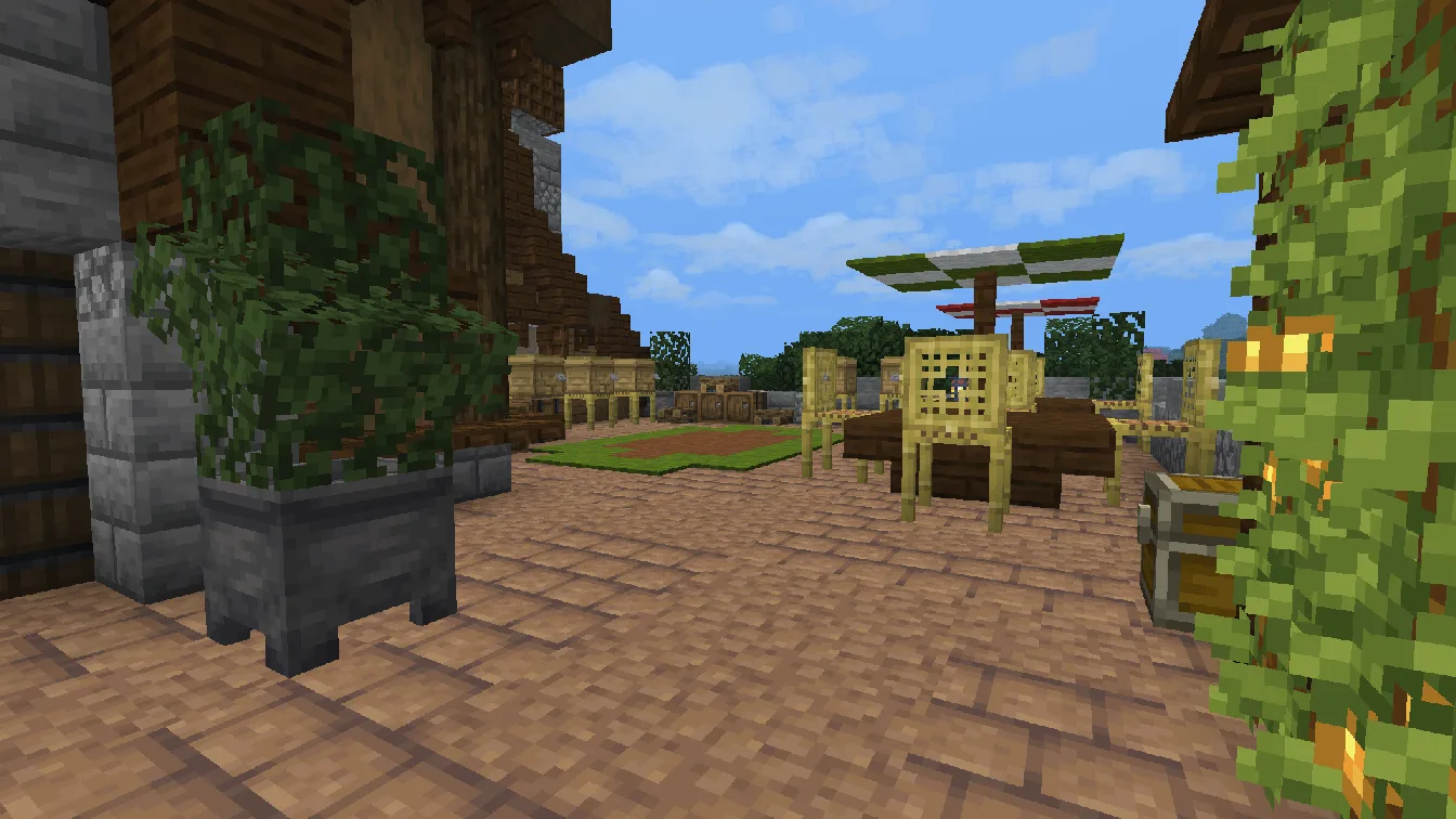 Зона отдыха снаружи лесного особняка в Minecraft.