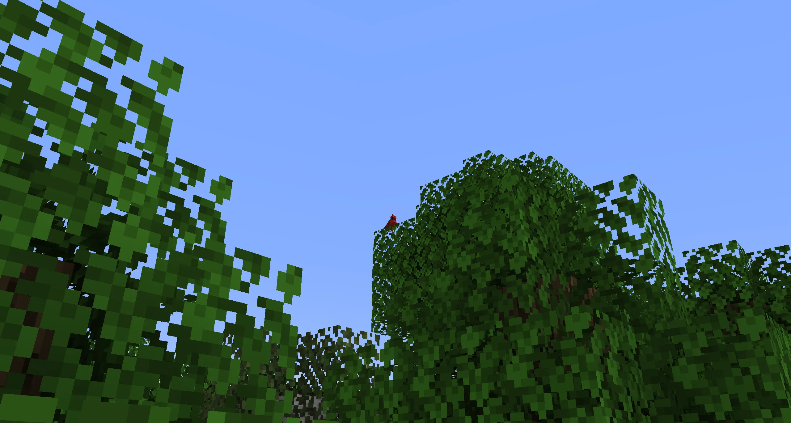 Пиксельный северный кардинал, сидящий на ветке дерева.