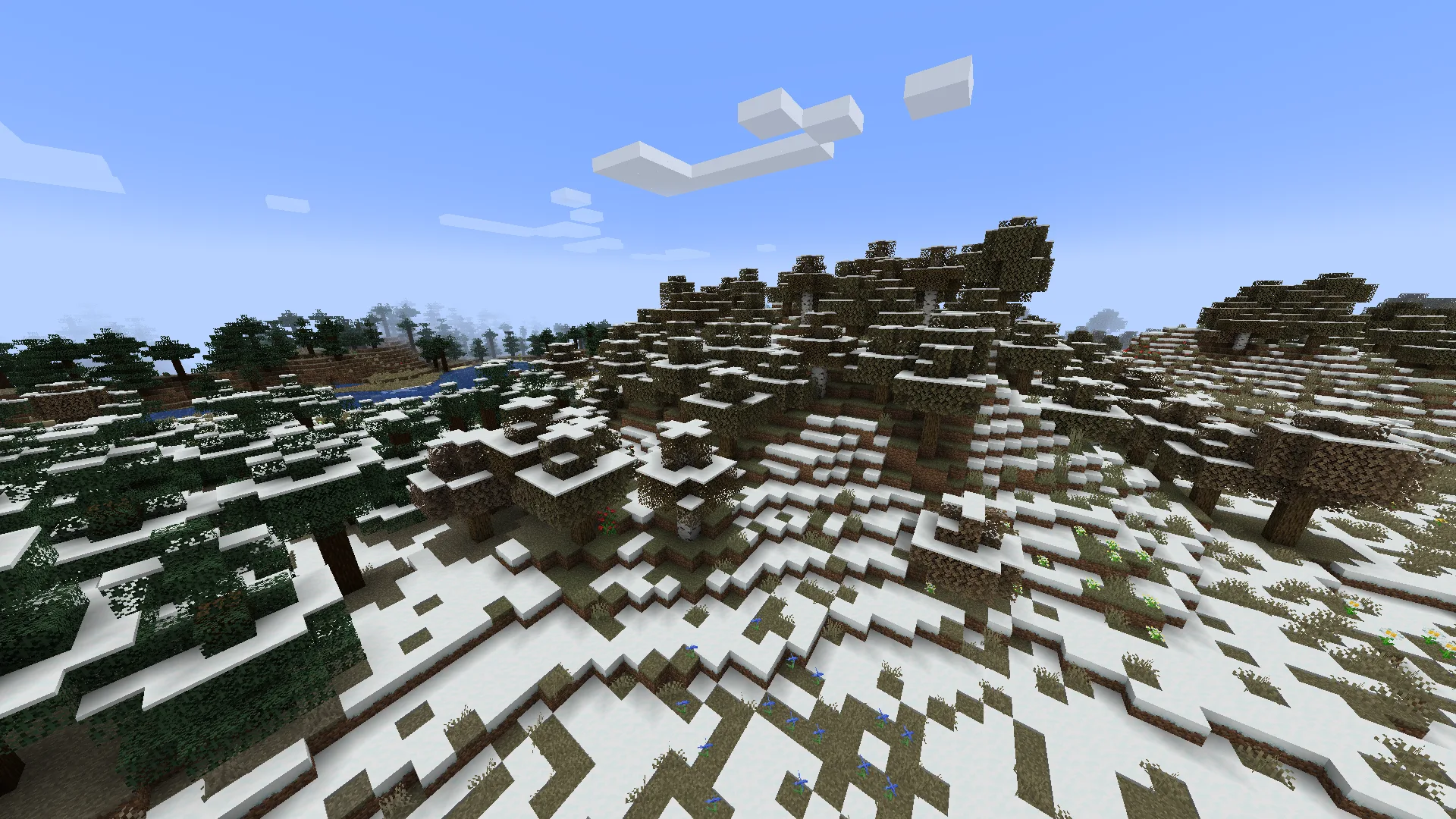 Заснеженный пейзаж в Minecraft с модом Serene Seasons, передающий начало зимы.