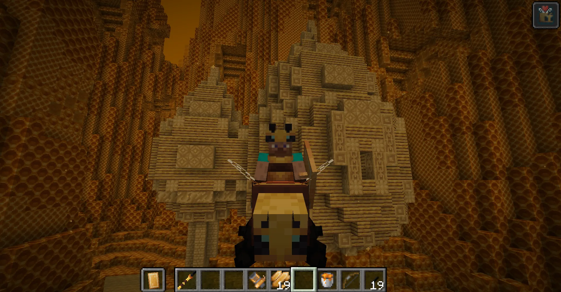 Игрок верхом на Бигемоте на фоне храма улья в измерении The Bumblezone.