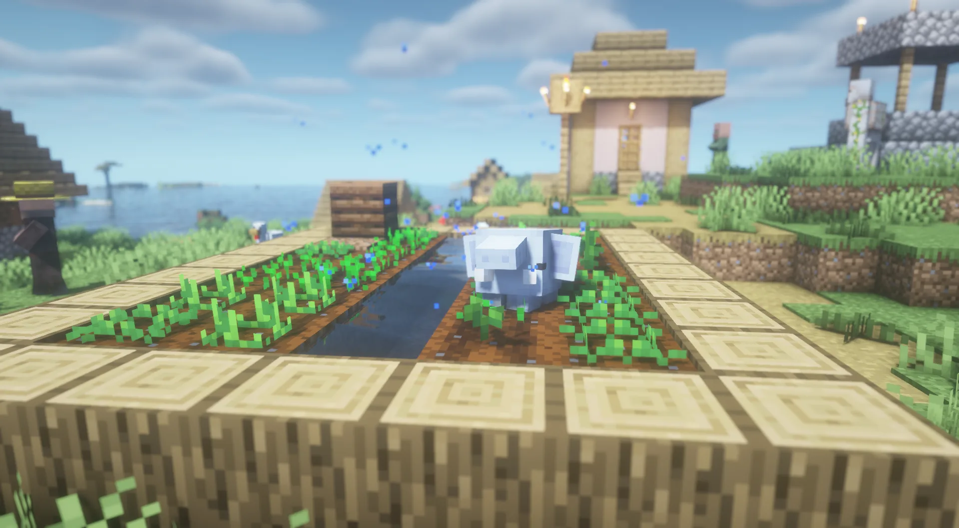 Маленький слон из мода Sprout в цветочном лесу.