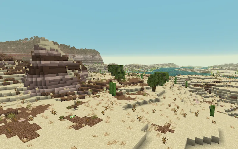 Ландшафт мода CliffBranch: пышная пустынная местность с обилием растительности, расположенная над пещерами или рядом с мангровыми зарослями.