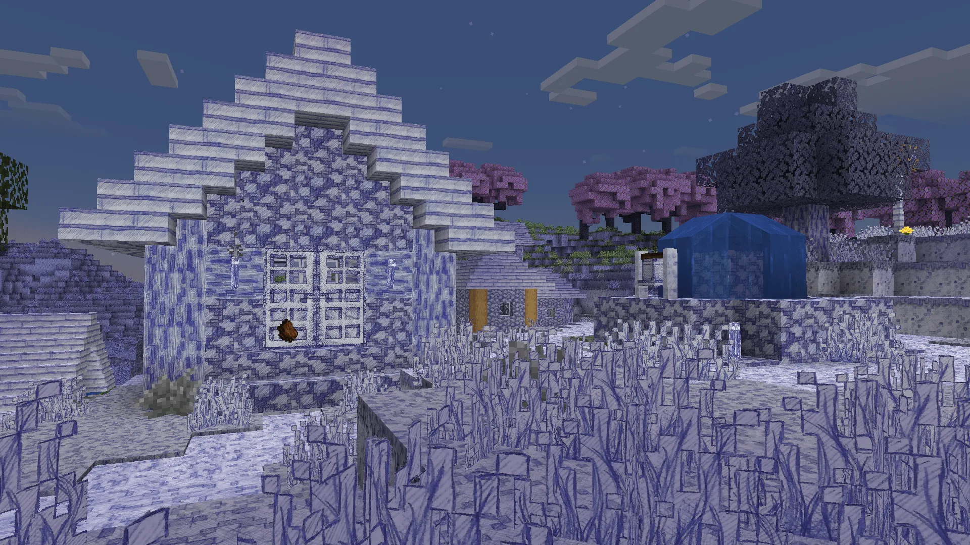 Деревня в Minecraft с использованием набора текстур Paddy's Hand-Drawn Textures.