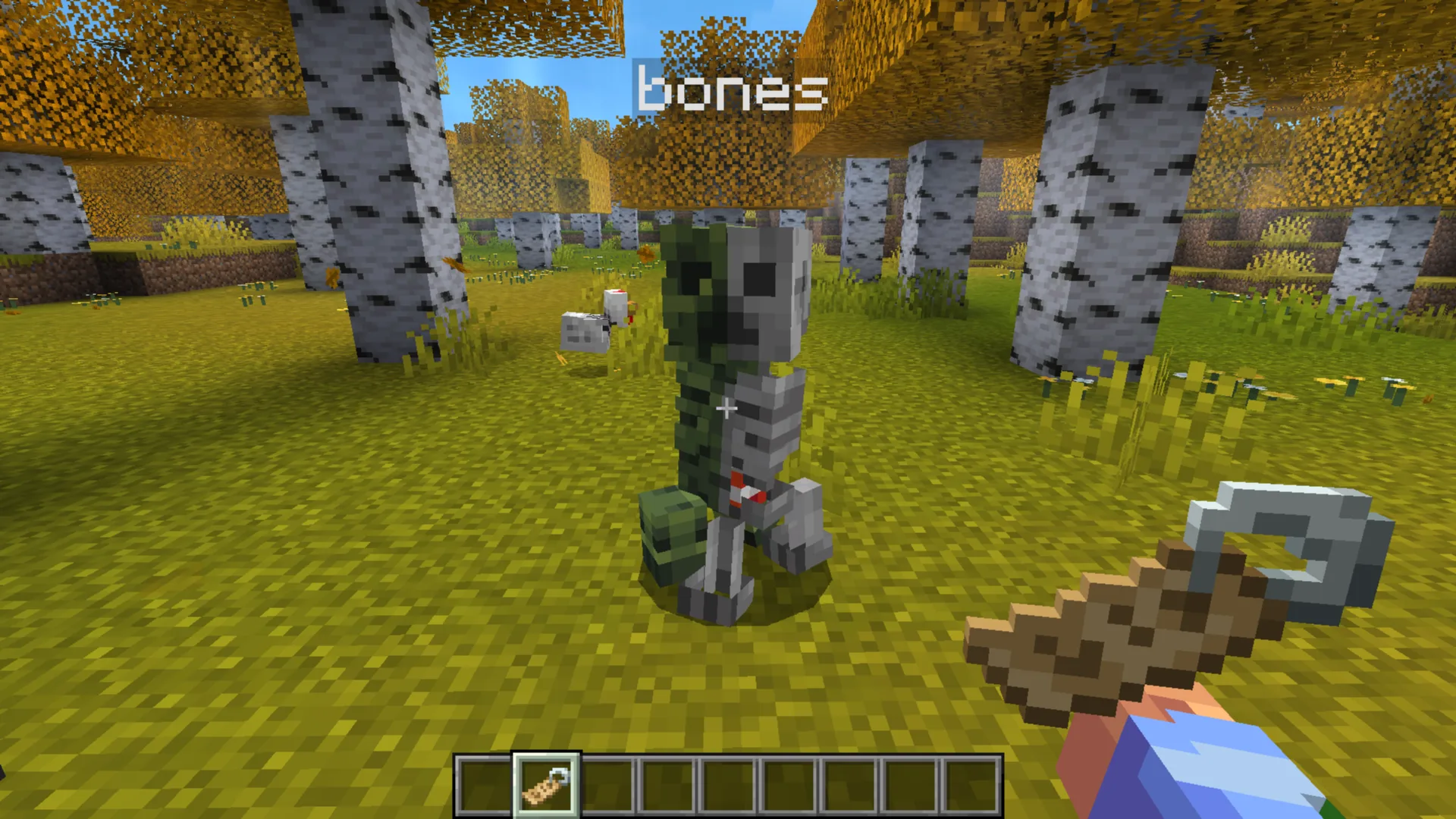 Крипер с табличкой "bones", превращающийся в Крипера-анатома.